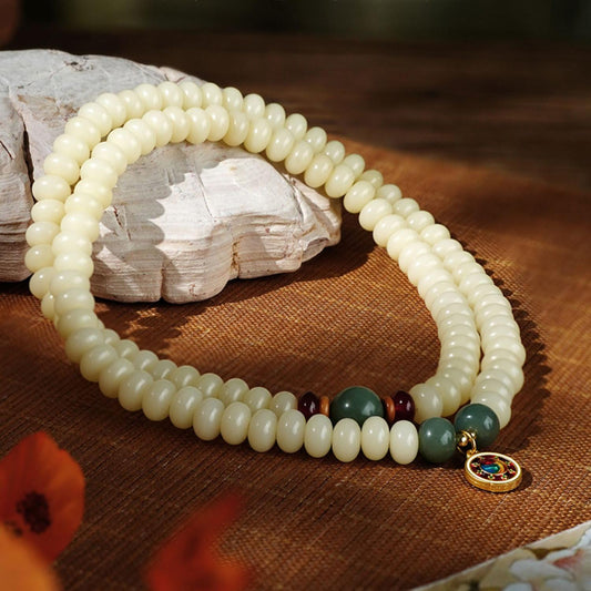 Handmade Bodhi 108 mala Yunshui Jing featuring agate 8x4mm beads and alloy spinning charm.