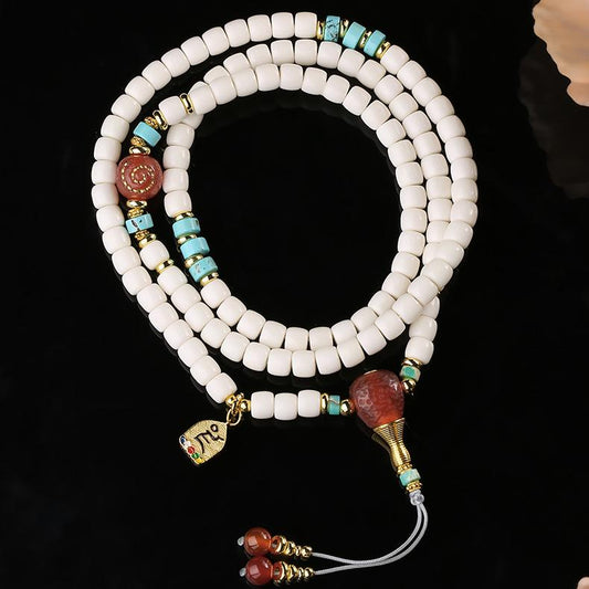 Tibetan Buddhist handcrafted bone and red agate 108 beads mala necklace with glass and brass details