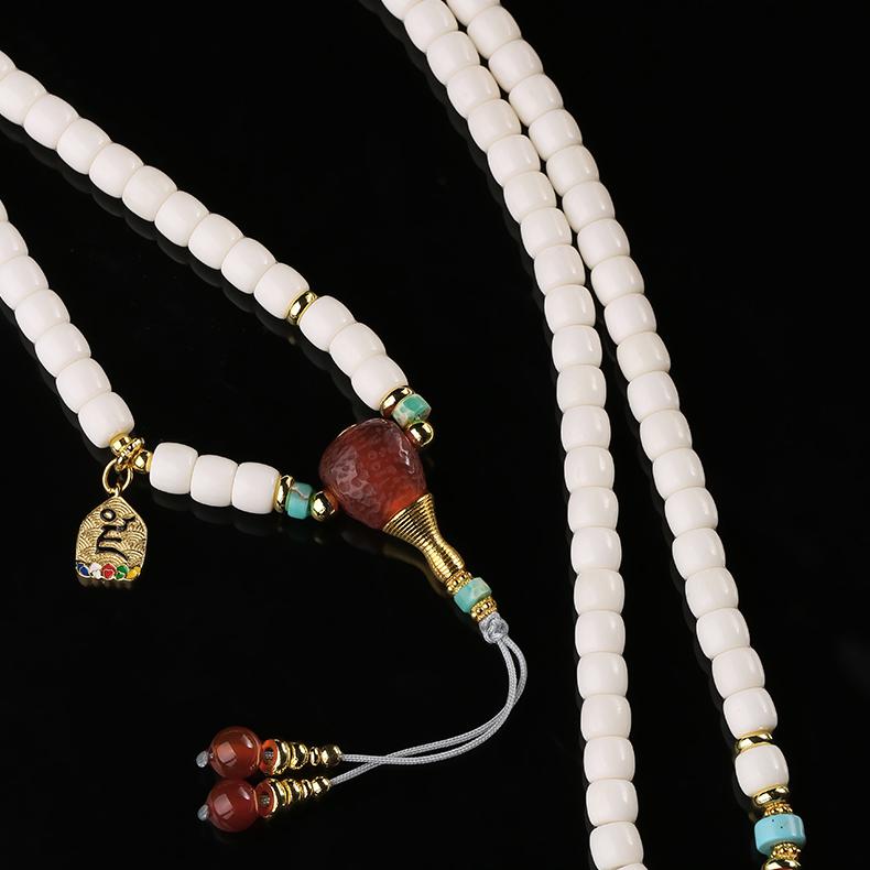 Tibetan Buddhist bone mala with large red agate guru bead and adjustable handmade cord