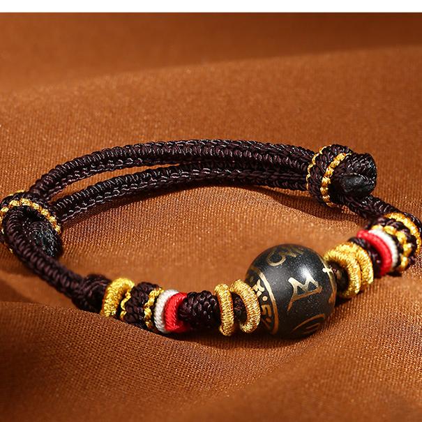 Handmade Tibetan Buddhist brown bracelet with incense-ash embedded Six-Syllable Mantra bead, adjustable 16cm design.