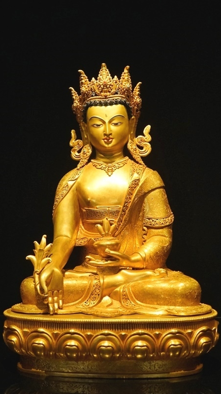 Alt Text: Exquisite handcrafted Tibetan Buddhist Buddha statue, gilded with gold and painted with mineral pigments. A rare masterpiece of spiritual art and craftsmanship.