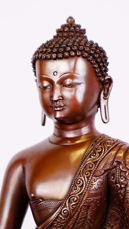 "A beautiful copper Buddha statue of Amitabha, handcrafted and painted with mineral pigments to embody divine compassion and infinite wisdom." 