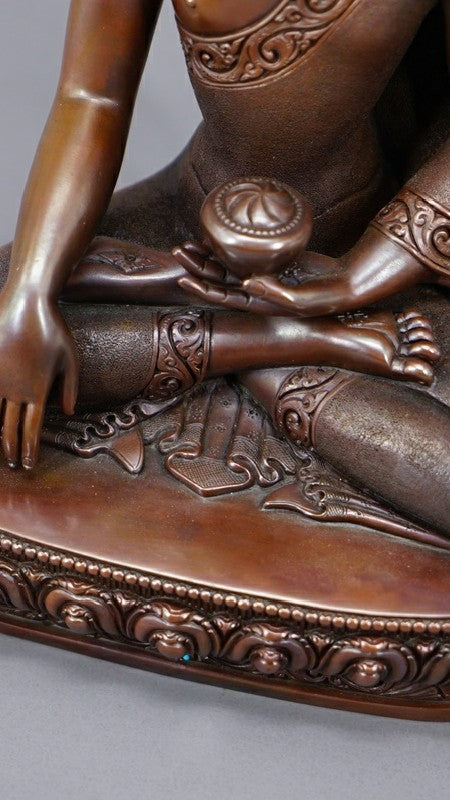 Shakyamuni Buddha Statue made from pure copper and mineral pigments, handcrafted with intricate details, ideal for spiritual practice and mindfulness.
