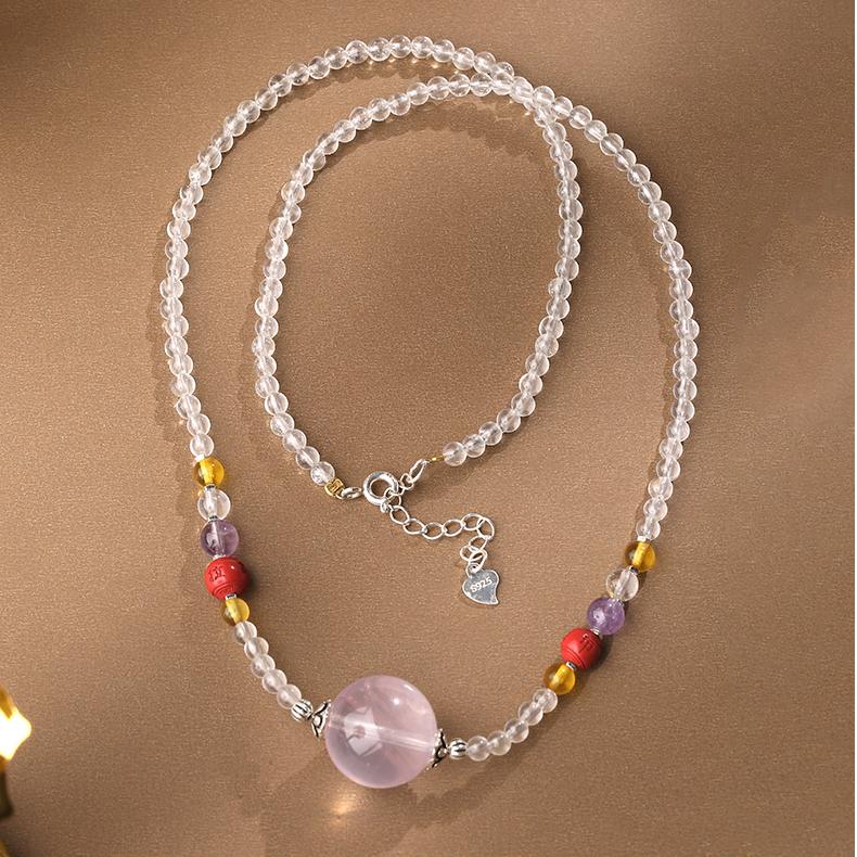 Handmade Tibetan Buddhist white crystal cinnabar necklace symbolizing clarity and healing.