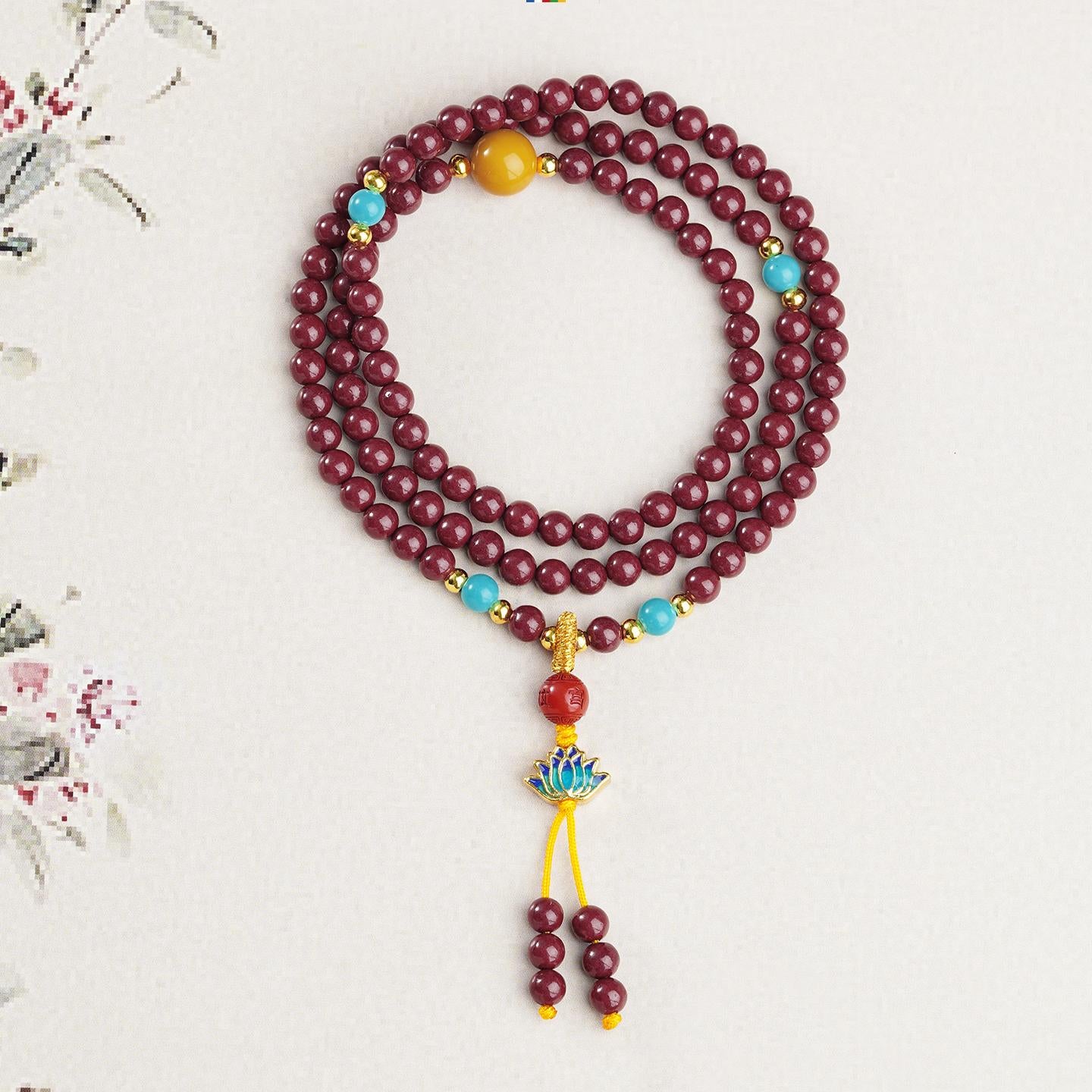 Handmade Tibetan Buddhist cinnabar 108 mala with amber, glass beads and copper details, spiritual meditation jewelry.