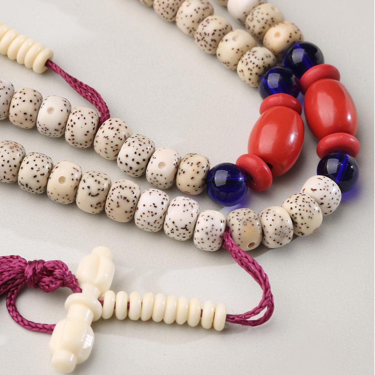 Bodhi seed mala with cinnabar pendant and lapis lazuli three way bead