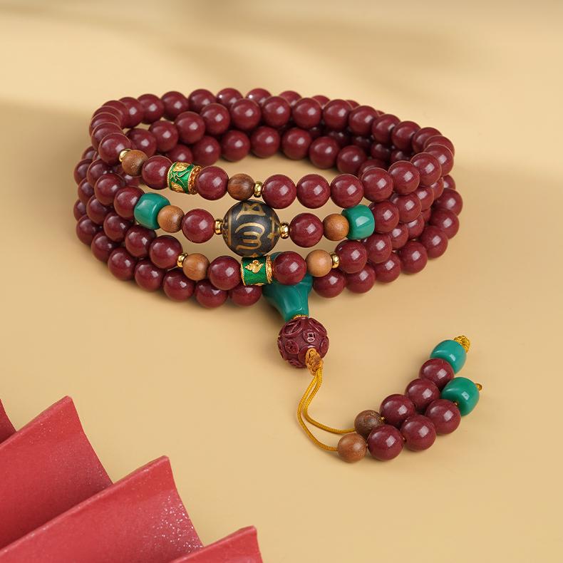 Tibetan-Buddhist cinnabar and glass mala necklace with sandalwood, incense ash, and copper beads, handcrafted spiritual jewelry