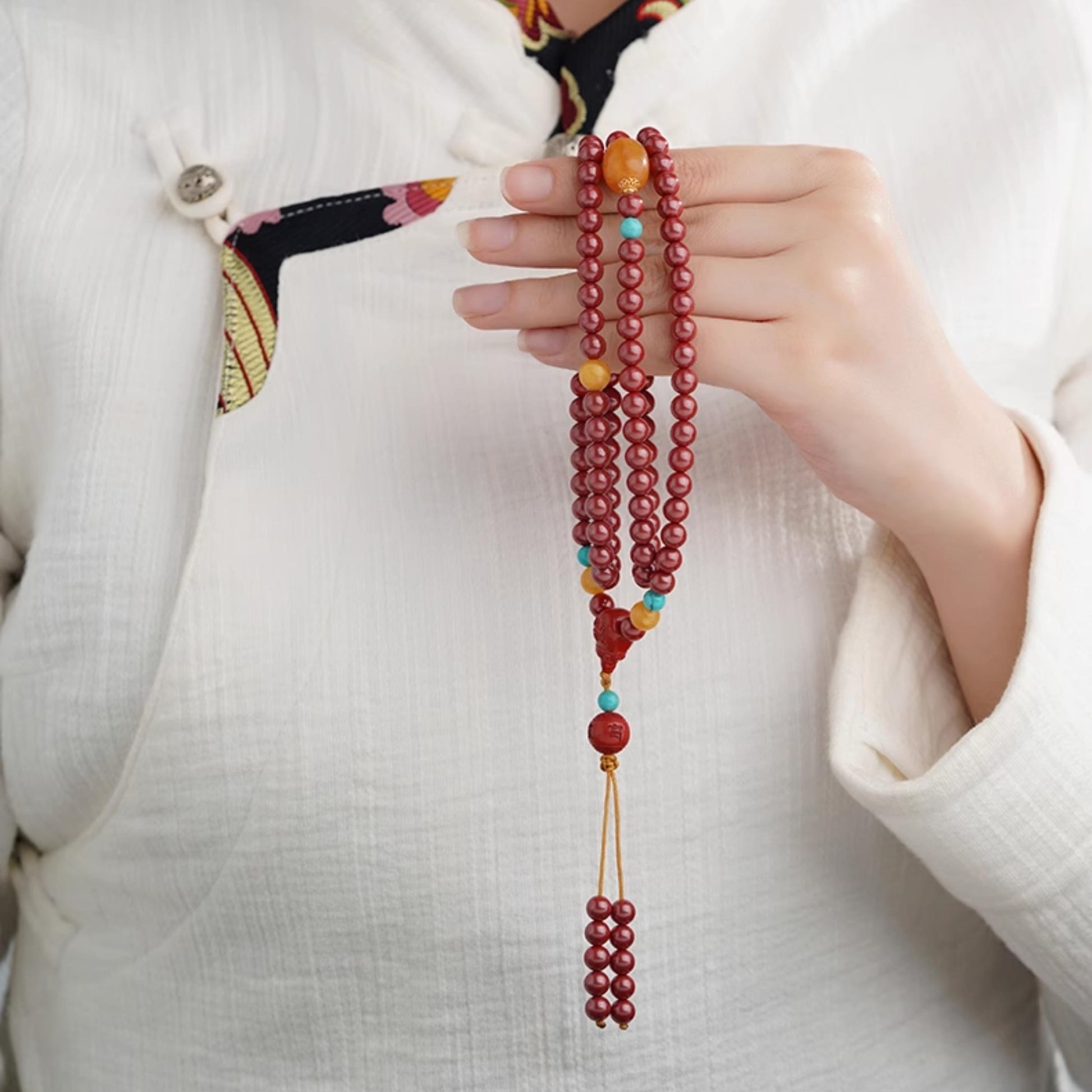 Tibetan Buddhist cinnabar mala jewelry art with natural amber and turquoise beads