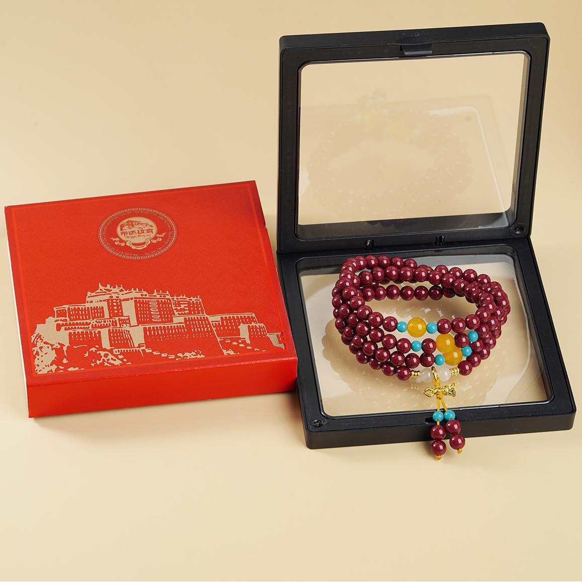 Tibetan Buddhist handmade cinnabar mala with 108 beads and copper blessing charm, meditation and ritual accessory.