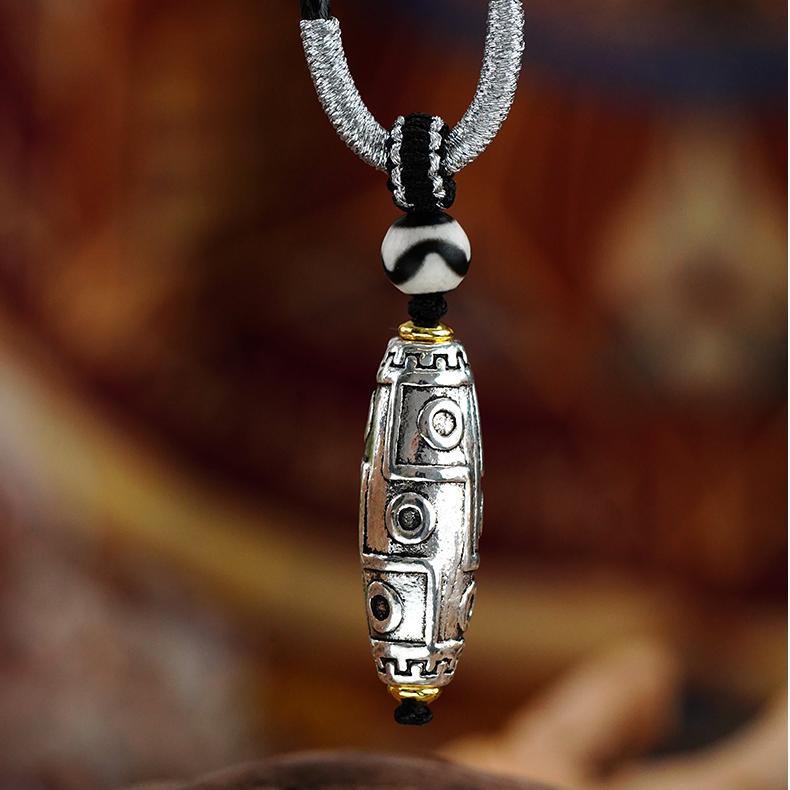 Tibetan Buddhist Copper Nine Eye Bead Pendant with Tian Zhu and Bottle Elements