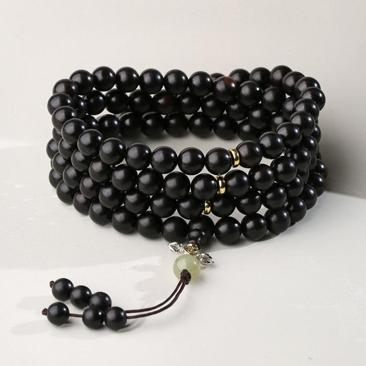 Handmade Tibetan Buddhist ebony 108 bead mala necklace with jade accents