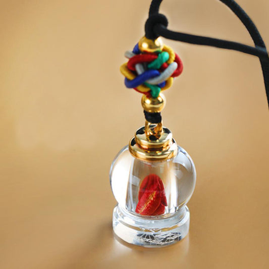 Handcrafted Tibetan Buddhist clear quartz vase pendant symbolizing purity and blessings.