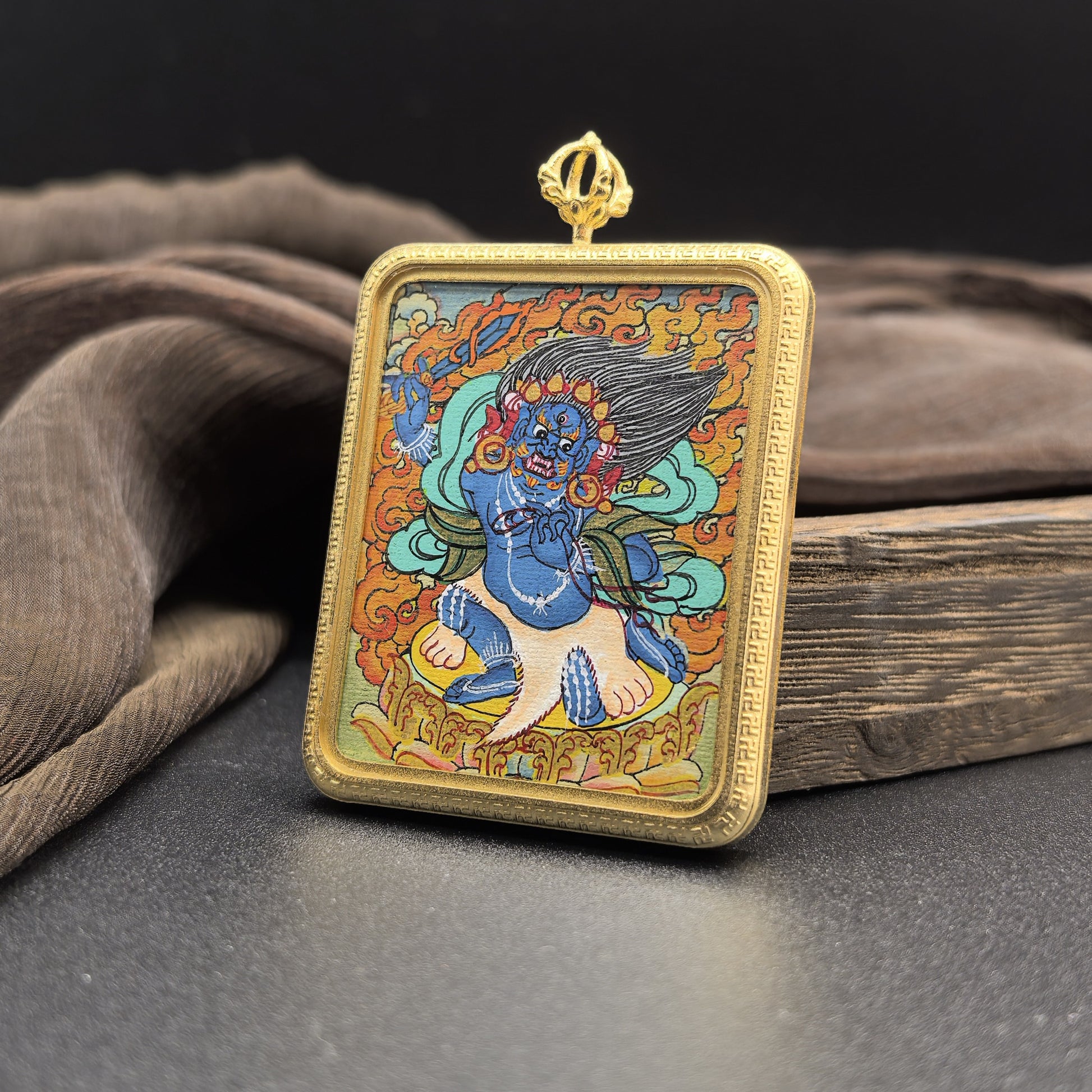 Hand-painted Nepal Acala (不动明王) Thangka pendant 4x5cm with titanium casing featuring the Immovable Wisdom King, representing protection and the removal of obstacles in Buddhist tradition.
