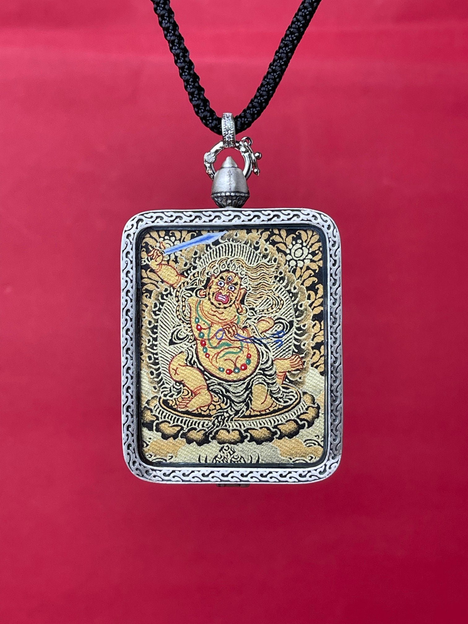  Close-up detail of the Rekong Black Gold Acala Thangka showing mineral pigments and layered pure gold, supports testing.
