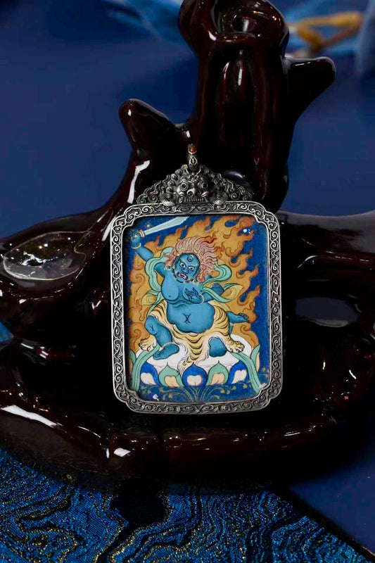 Acala thangka amulet used in Tibetan Buddhism for spiritual protection, stability, and overcoming negative forces.