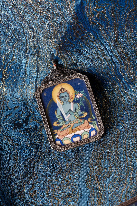 Akasagarbha Bodhisattva thangka pendant depicting the Tibetan Buddhist deity of boundless wisdom and spiritual insight.