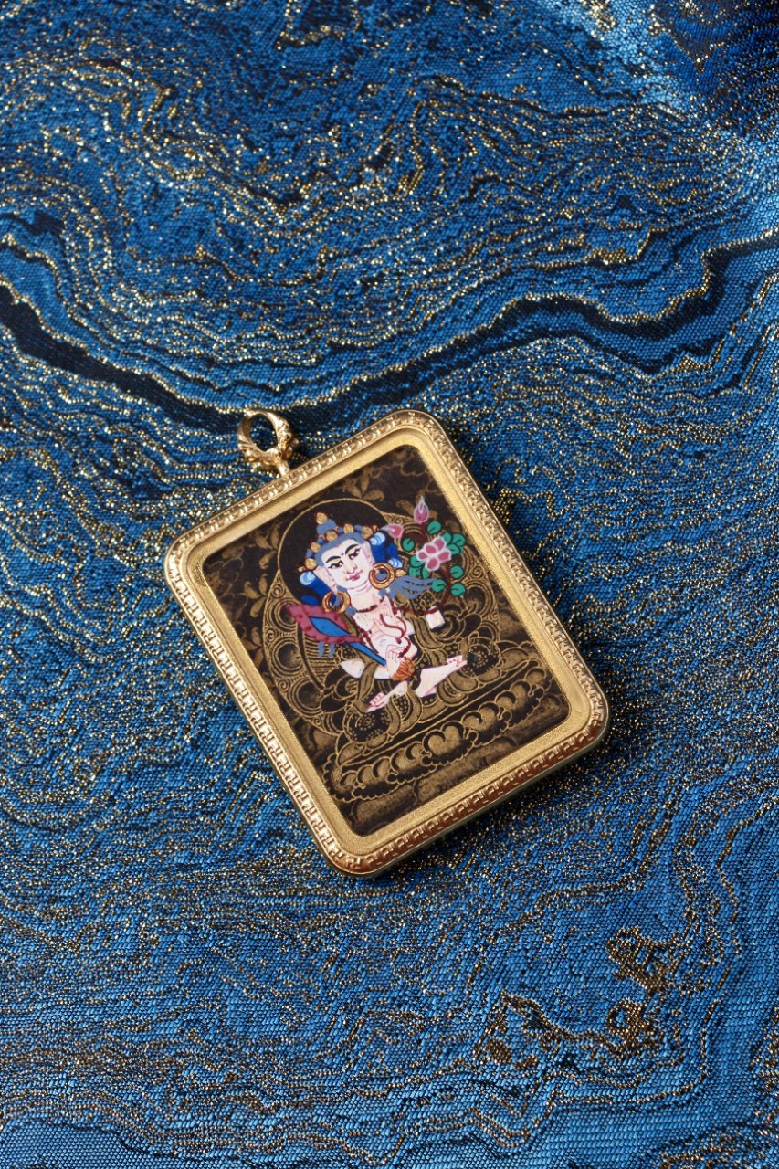 Akasagarbha Bodhisattva thangka pendant depicting the Tibetan Buddhist deity of boundless wisdom and spiritual abundance.