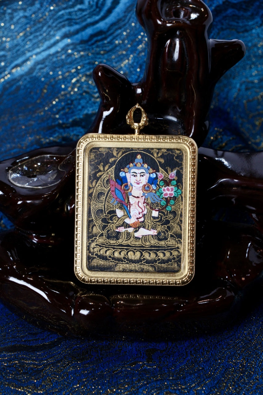 Akasagarbha thangka pendant representing the Bodhisattva of infinite knowledge, wisdom, and guidance in Tibetan Buddhism.