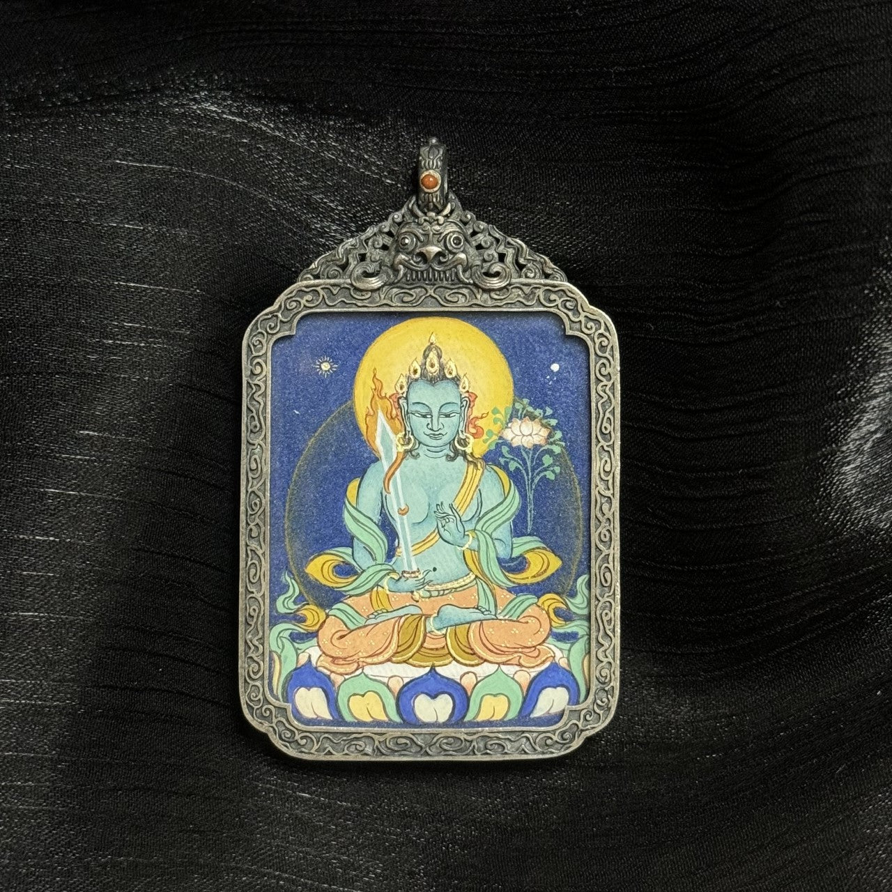  A 3.5x4.5cm hand-painted Bold-style Akasagarbha Bodhisattva Thangka pendant featuring the Treasury of the Void, encased in antique silver-tone metal, symbolising wealth and noble support in Tibetan Buddhist tradition.
