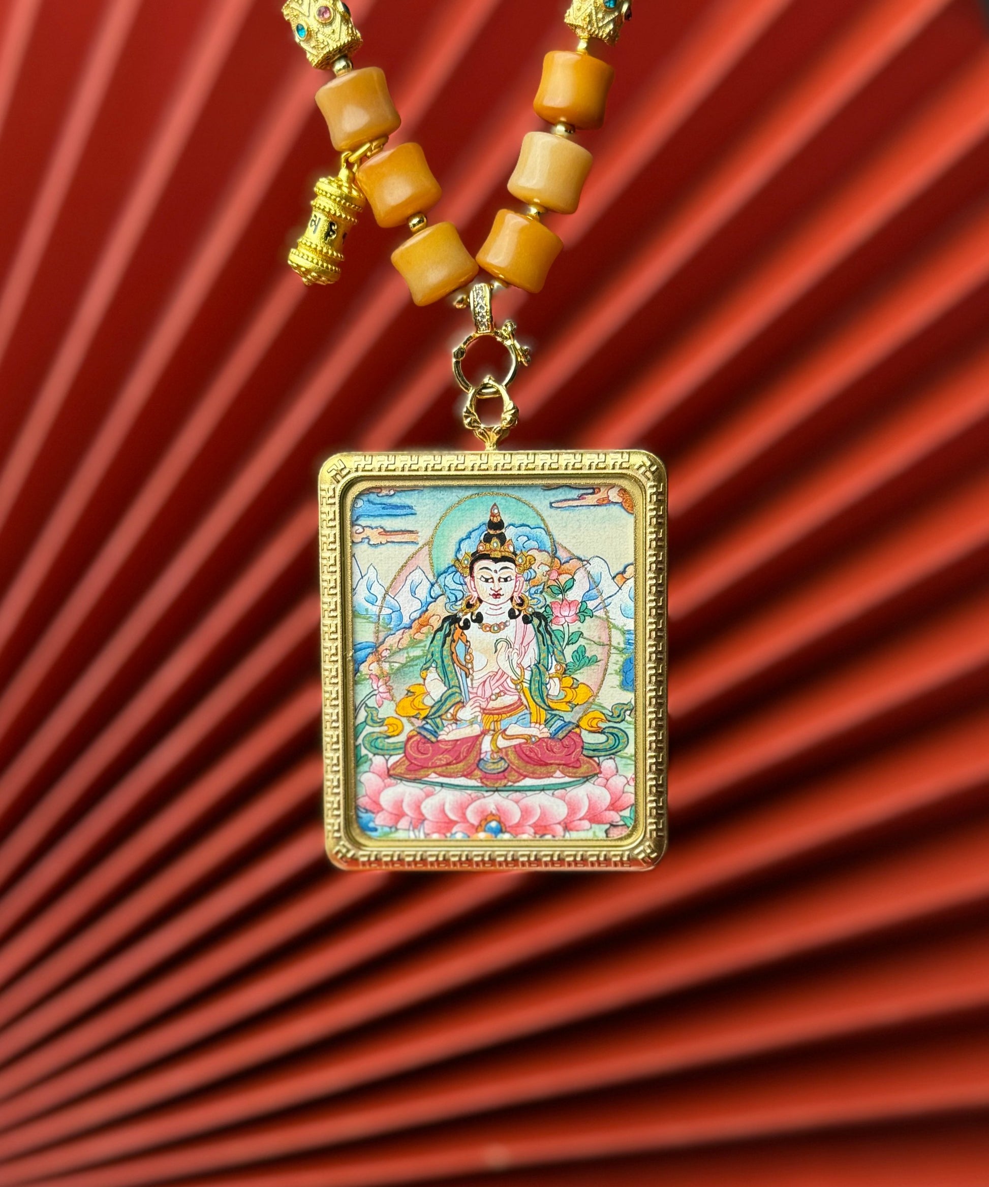  Detailed view of the titanium casing for the Akasagarbha Thangka pendant, symbolising wealth and tradition in Buddhist practice.
