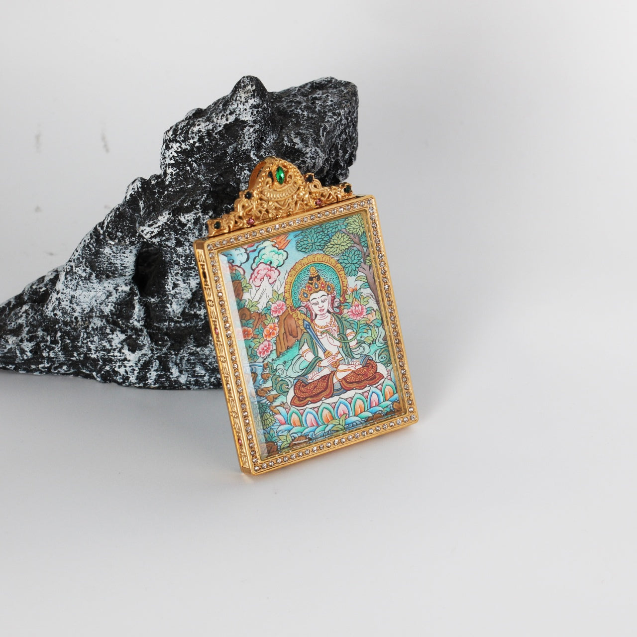  Close-up detail of the Nepal Premium Akasagarbha Thangka painting showing intricate natural mineral pigment work, showcasing the masterful artistry of Nepali lineage painters.

