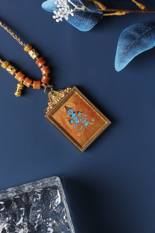 A 4x5cm hand-painted Rebgong Akasagarbha Bodhisattva Thangka pendant featuring the Bodhisattva of the Space Treasury, encased in titanium steel, representing wealth and merit in Tibetan Buddhist tradition.

