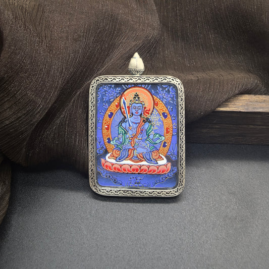  Close-up detail of the Rekong Blue Thangka Akasagarbha painting showing natural mineral pigments, showcasing the masterful artistry of Rekong lama painters.
