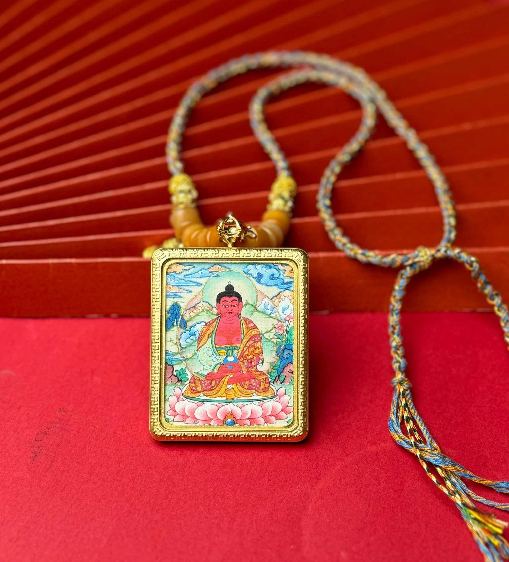  Close-up detail of the Nepal Amitabha Thangka showing hand-painted mineral pigments, showcasing the masterful artistry.
