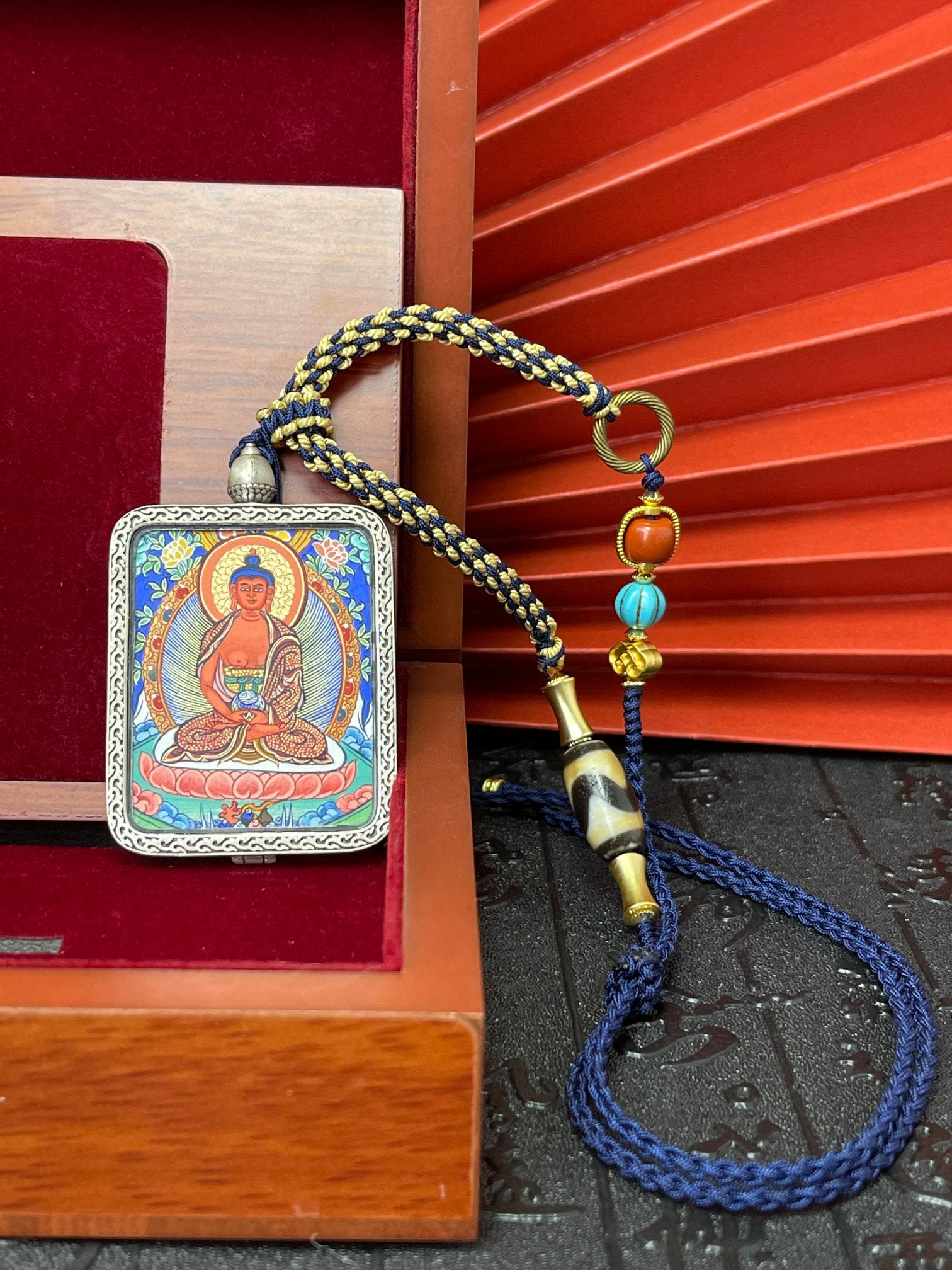  Hand-woven cord and 3.5x4.5cm Amitabha Rekong pendant, Rekong series.
