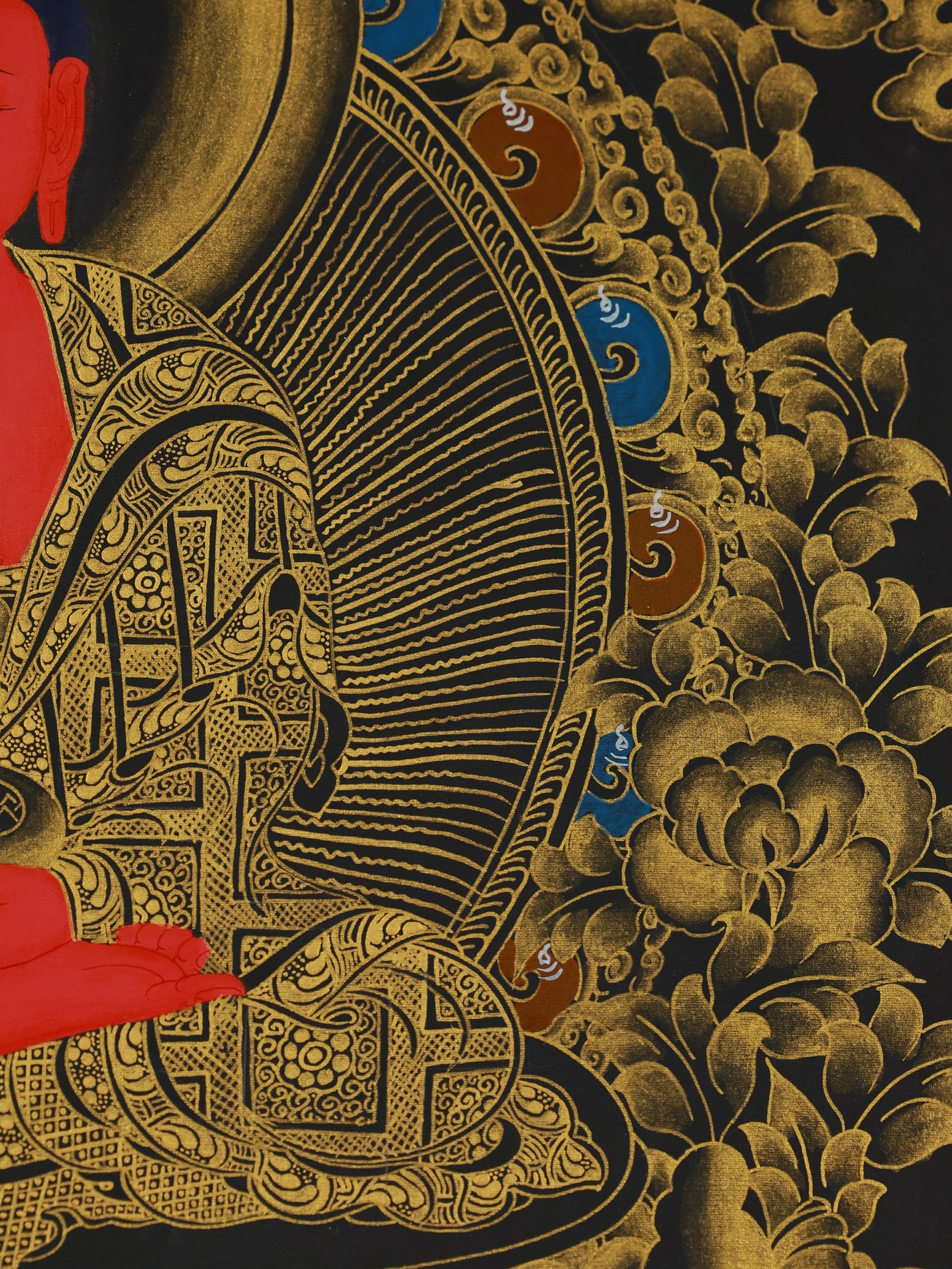 A hand-painted Amitayus Buddha thangka created with rich mineral pigments, highlighting the vibrant red tones associated with life force and vitality.