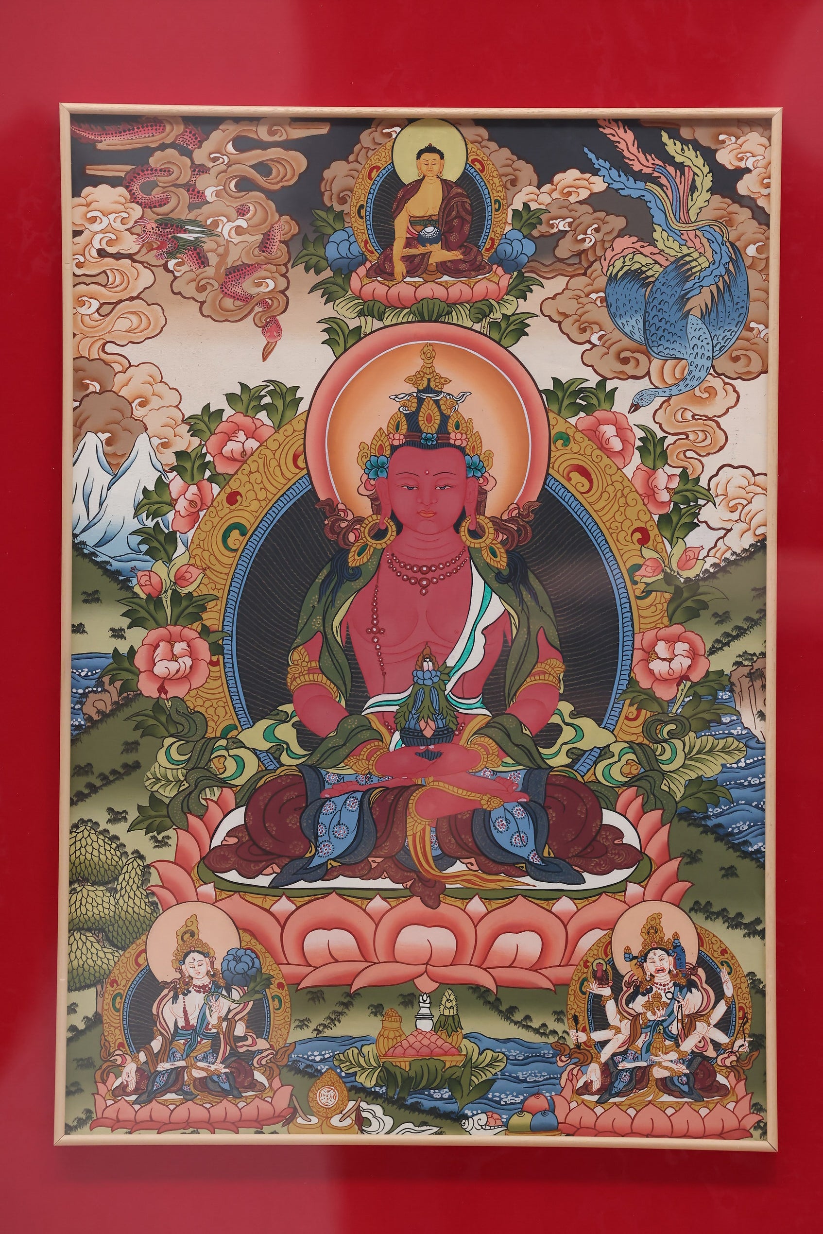 Tibetan Longevity Buddha Thangka with attendant deities surrounding the central figure for spiritual protection.