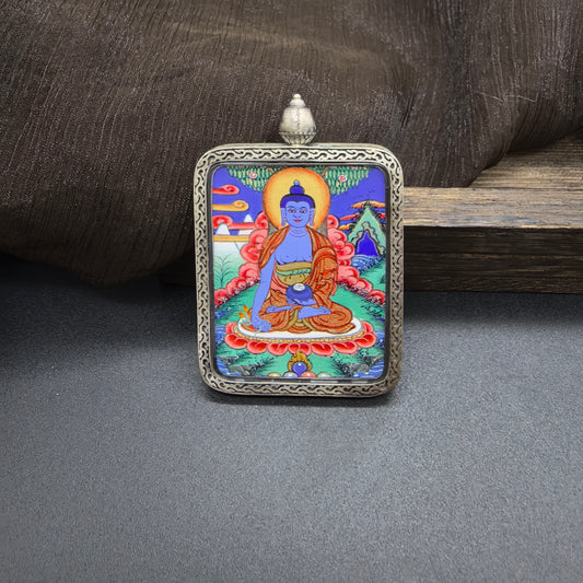 Close-up detail of the Rekong Bhaisajyaguru Thangka painting showing natural mineral pigments, showcasing the masterful artistry of Rekong lama painters.

