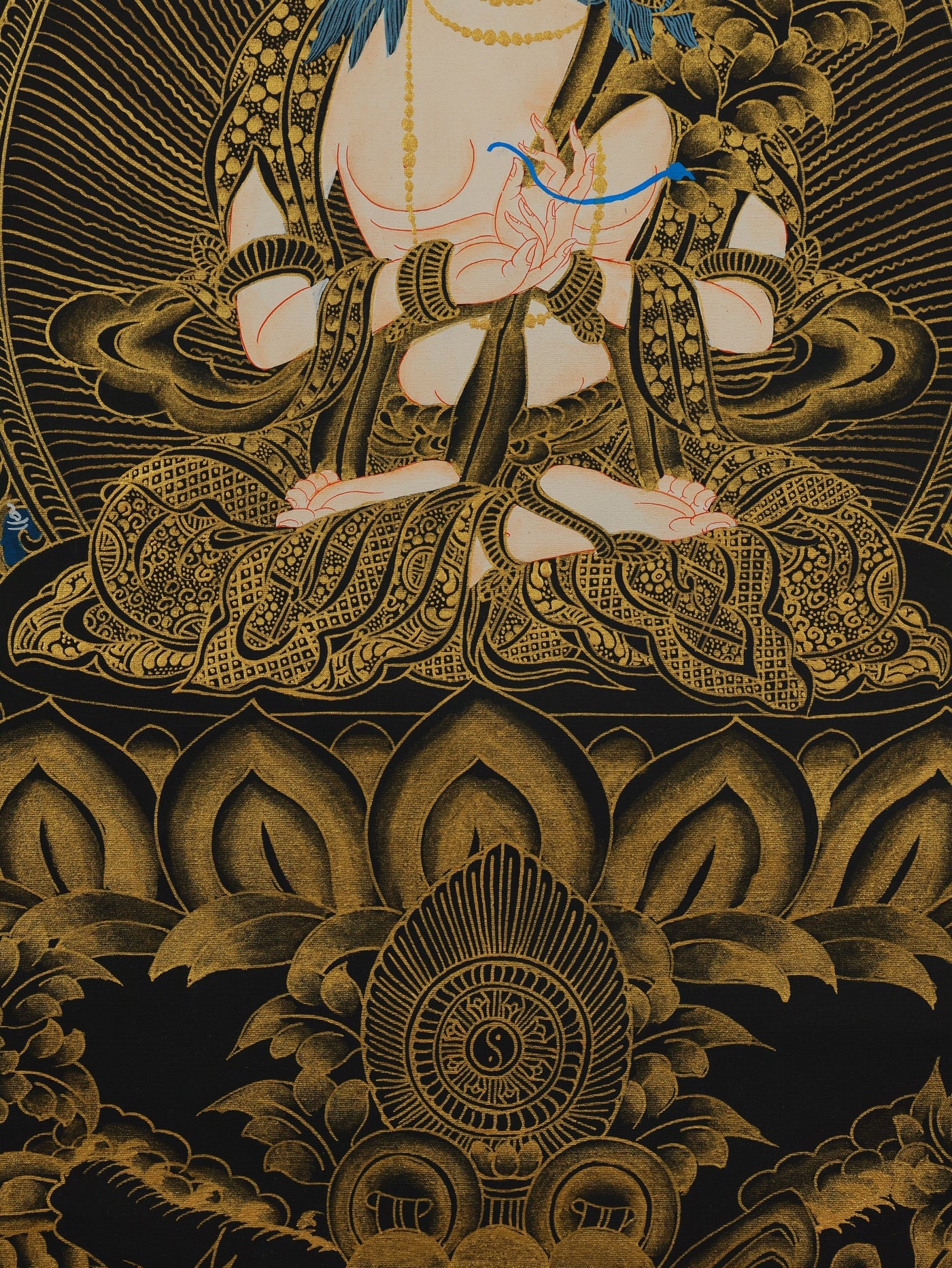 "Traditional Tibetan thangka depicting Mahasthamaprapta Bodhisattva with black-gold contrast"
