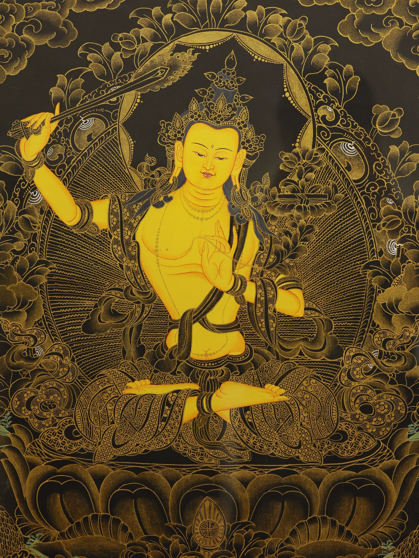Black gold Manjushri Bodhisattva Tibetan thangka representing supreme wisdom and enlightenment in Buddhist culture.