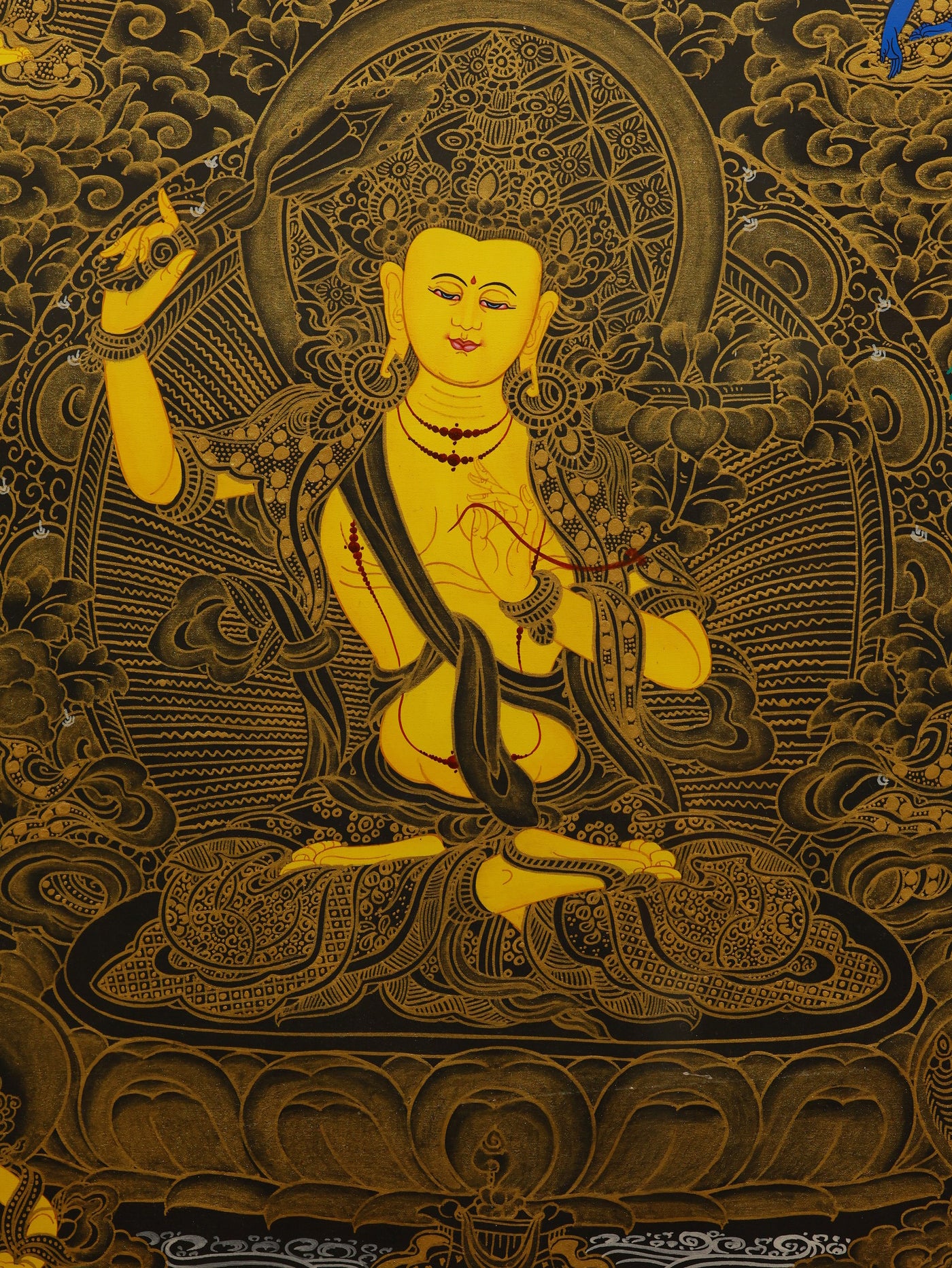 Sacred black gold Manjushri thangka painted in traditional Tibetan Buddhist style
