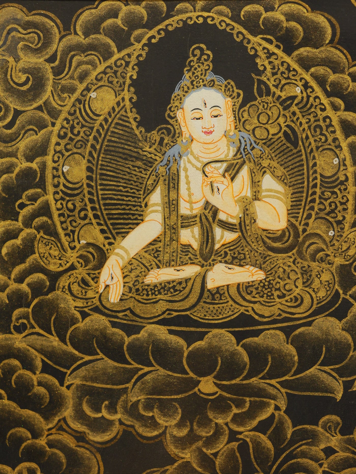 Black and gold Manjushri Wisdom Bodhisattva Thangka from Tibetan Buddhist culture, symbolizing insight, learning, and spiritual clarity