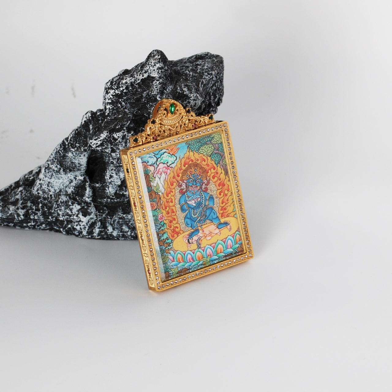  Hand-painted Nepal Premium Black Jambhala Thangka pendant featuring the Swift Wealth King, encased in titanium steel, representing swift wealth and protection in Tibetan Buddhist tradition.
