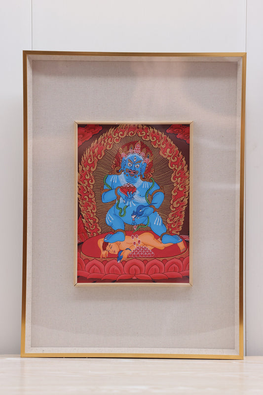 Traditional Tibetan Buddhist red thangka painting of Black Jambhala, revered as a powerful wealth and prosperity deity