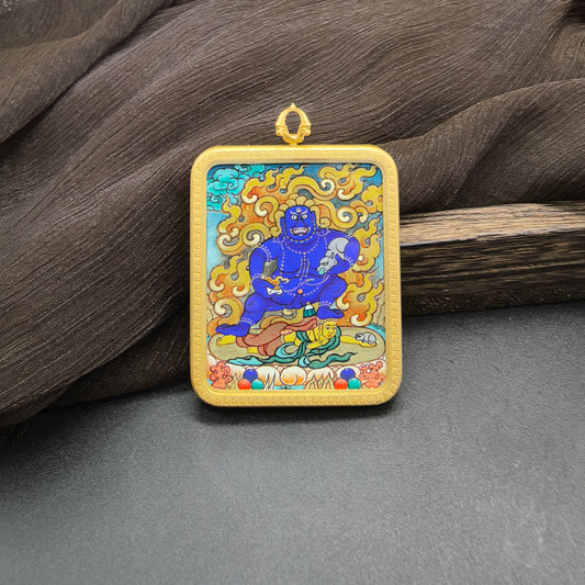  Detailed view of the matte copper casing for the Black Jambhala Thangka pendant, symbolising wealth and tradition in Buddhist practice.
