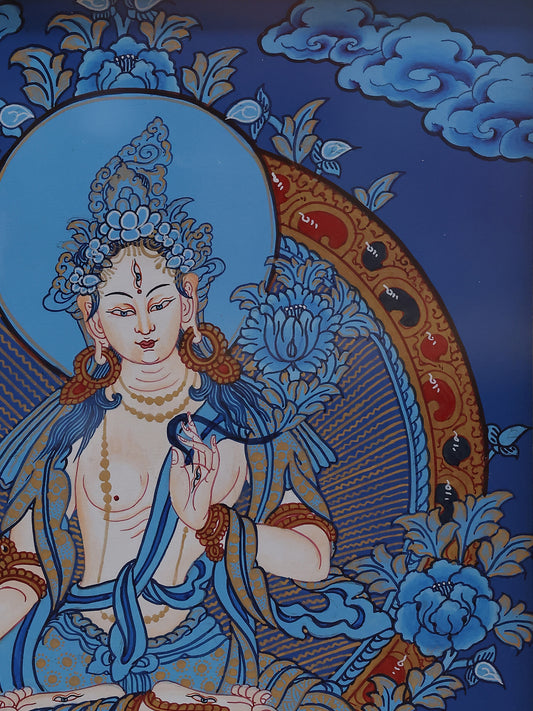 Traditional Tibetan Buddhist Blue Thangka artwork of White Tara, symbolizing long life, peace, and spiritual protection.