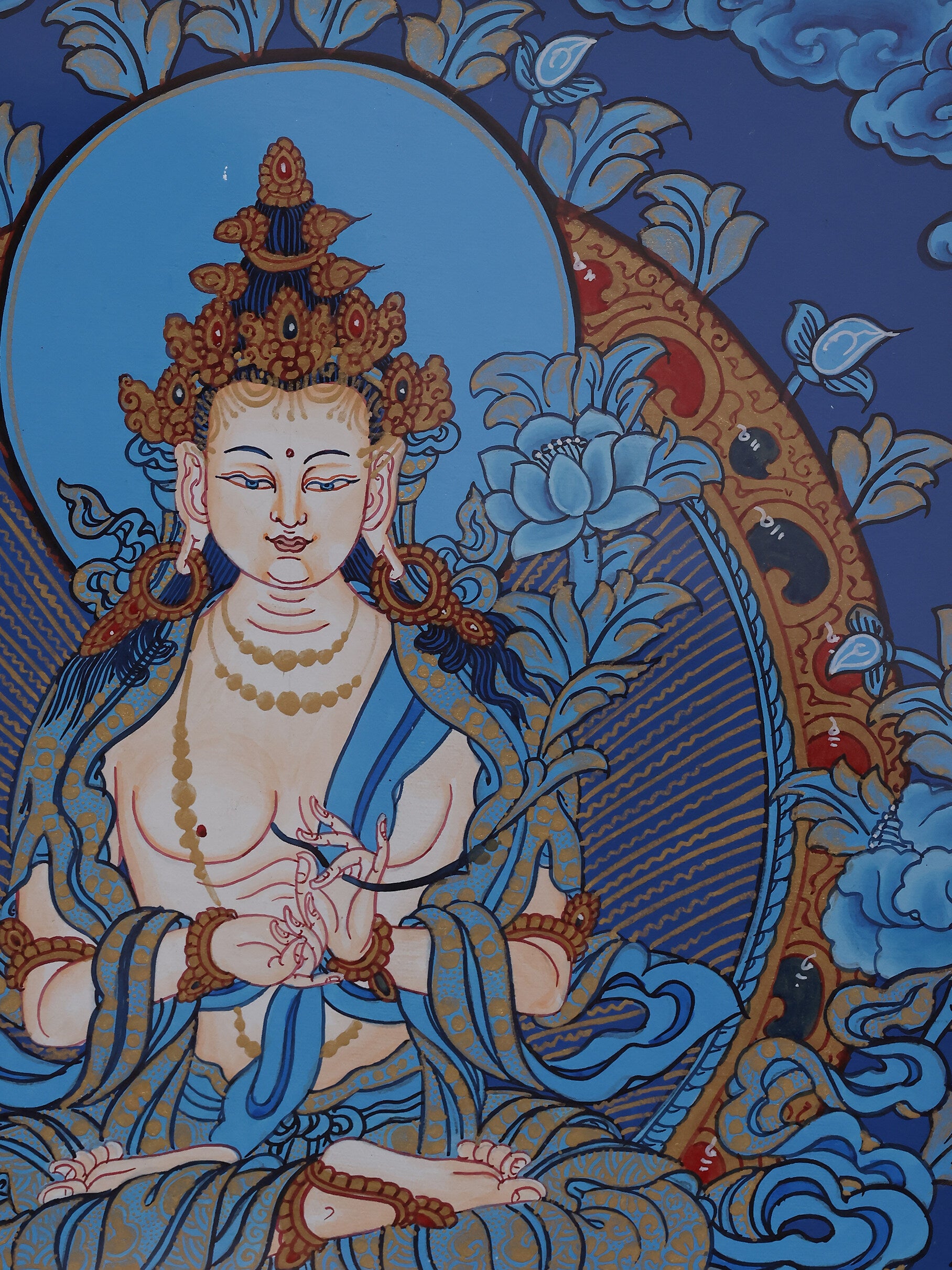 Tibetan Buddhist blue thangka showing Mahasthamaprapta Bodhisattva radiating compassion and enlightened energy