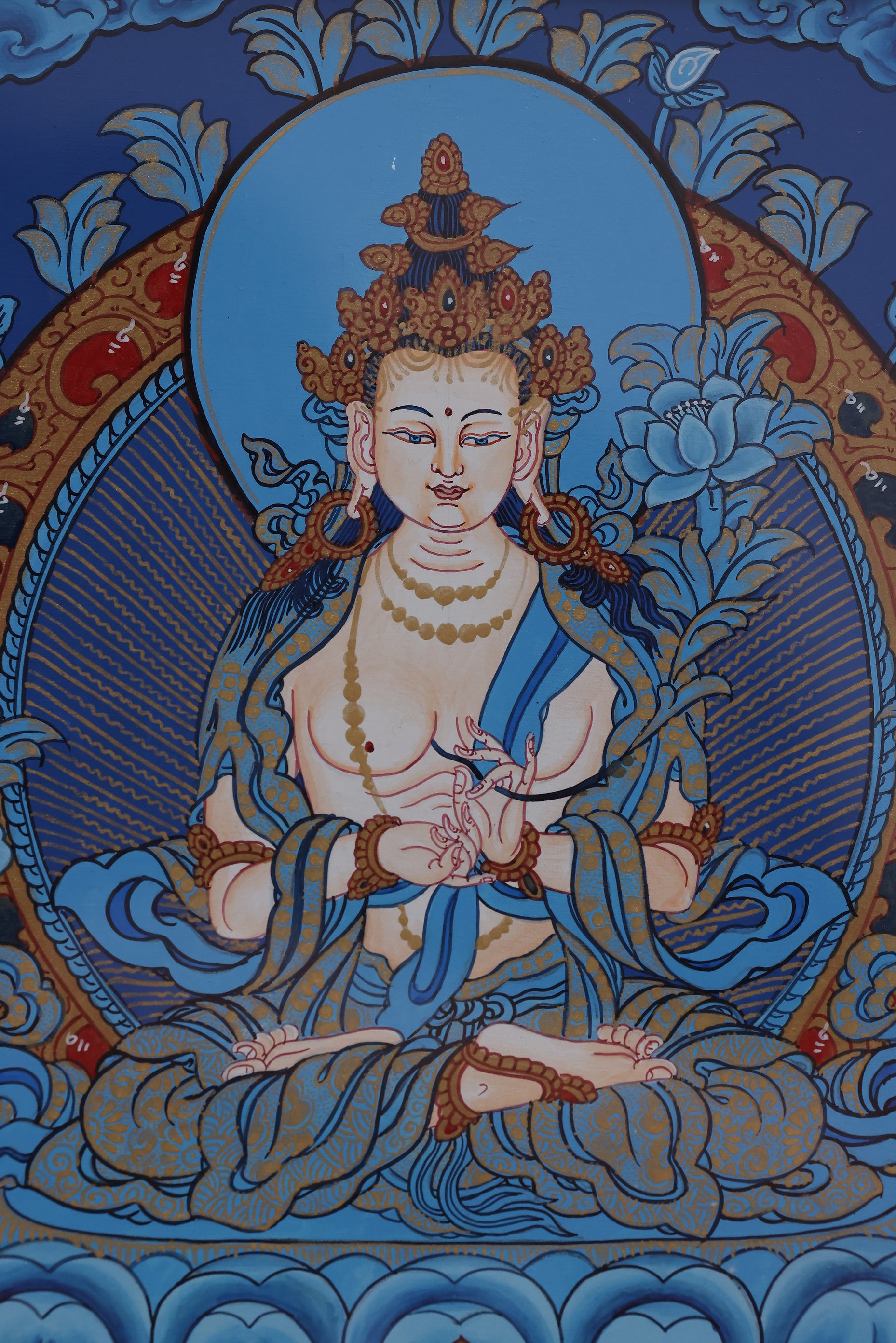 Meditative blue thangka of Mahasthamaprapta Bodhisattva offering spiritual protection and mindfulness support