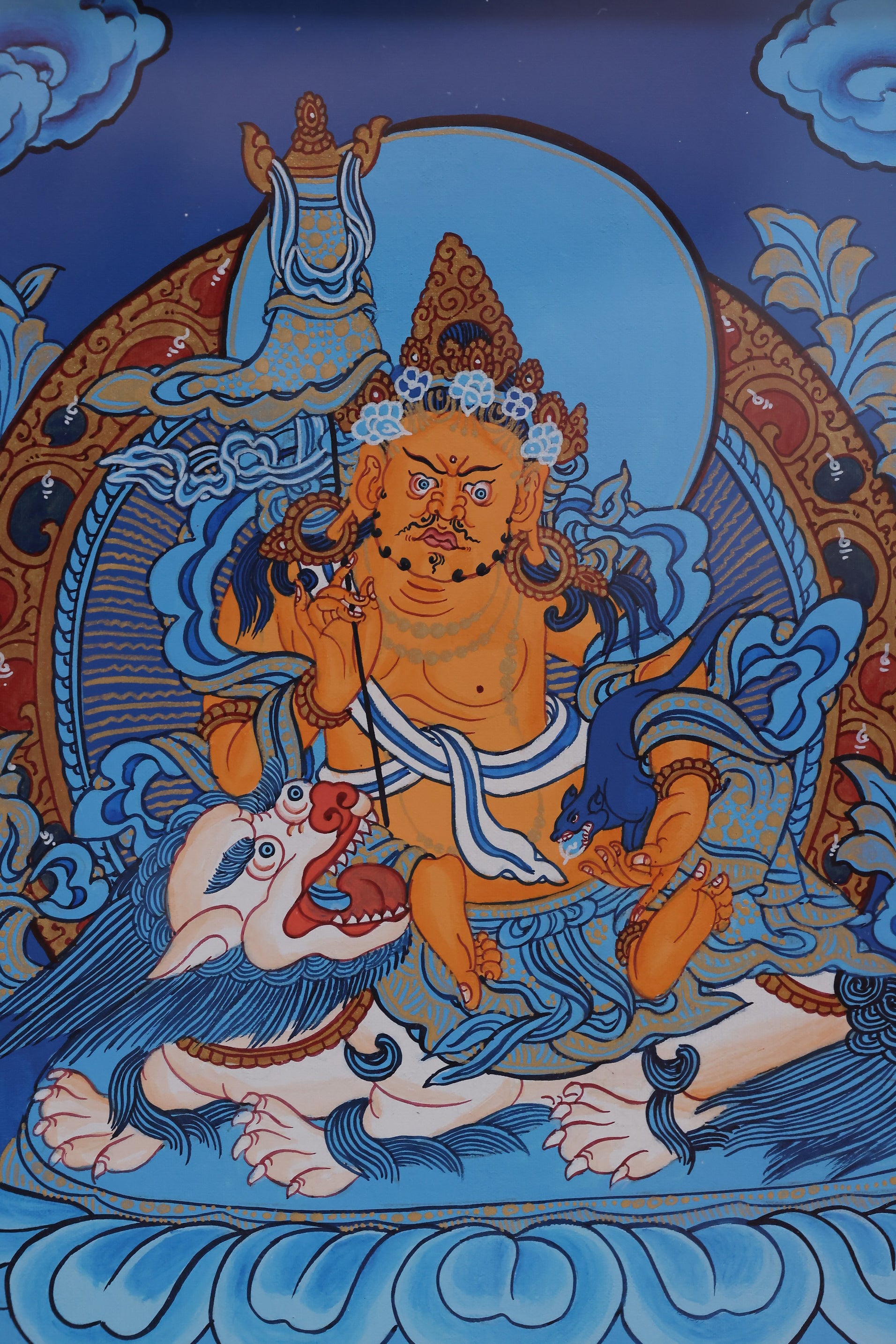 Alt text: Blue Treasure King Thangka artwork, Tibetan Buddhist hand-painted painting representing prosperity and protection.