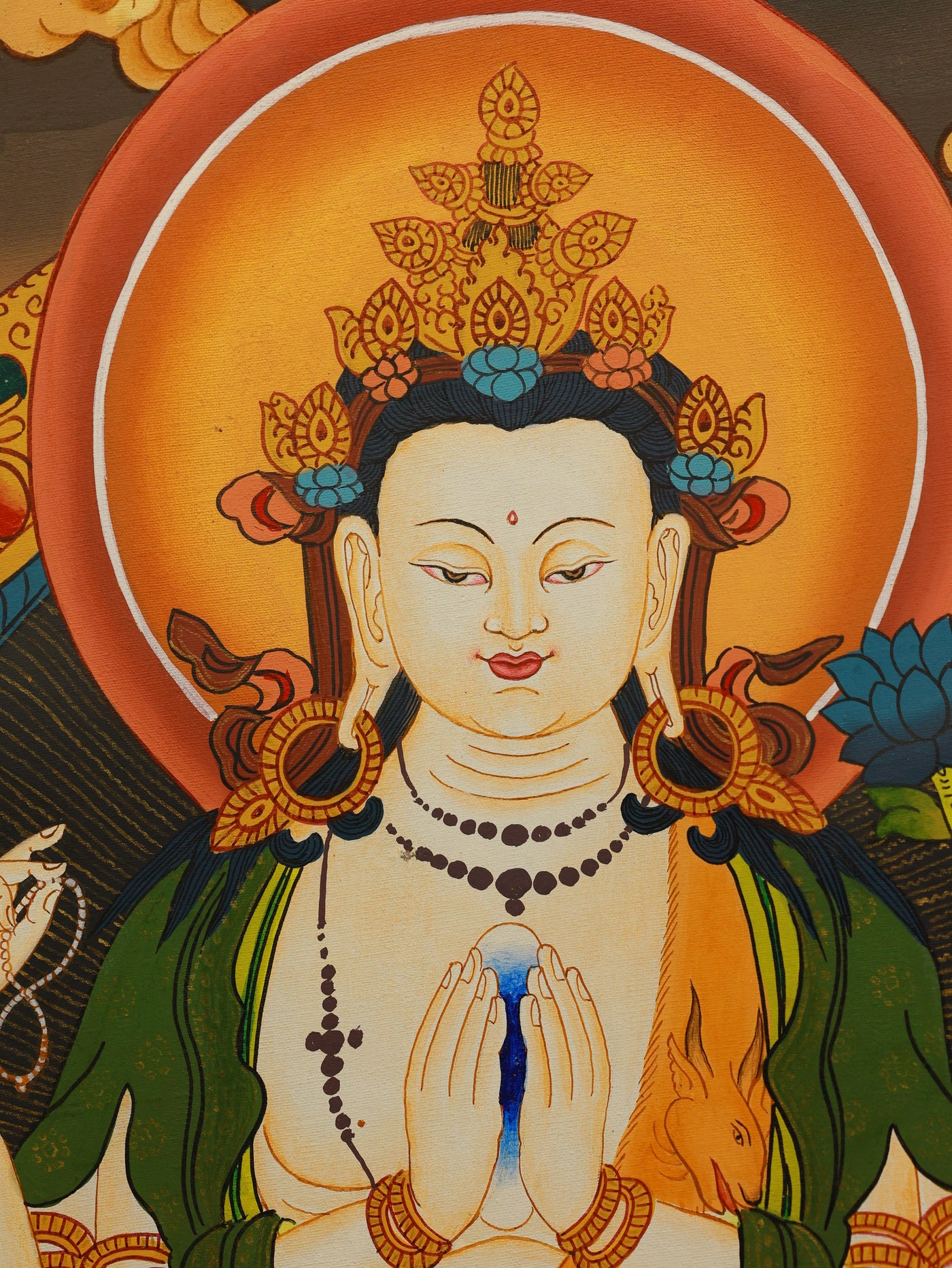Chenrezig bodhisattva with four arms in colorful Tibetan thangka painting