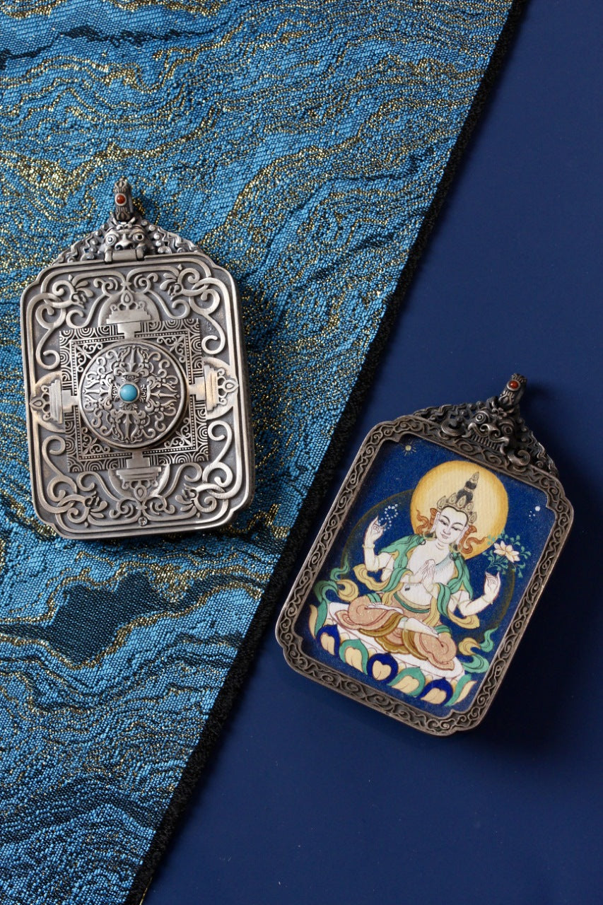 Four-Armed Avalokiteshvara thangka pendant depicting the Tibetan Buddhist deity of compassion and enlightened mercy.