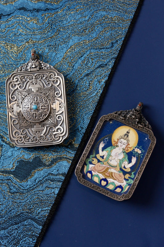 Four-Armed Avalokiteshvara thangka pendant depicting the Tibetan Buddhist deity of compassion and enlightened mercy.