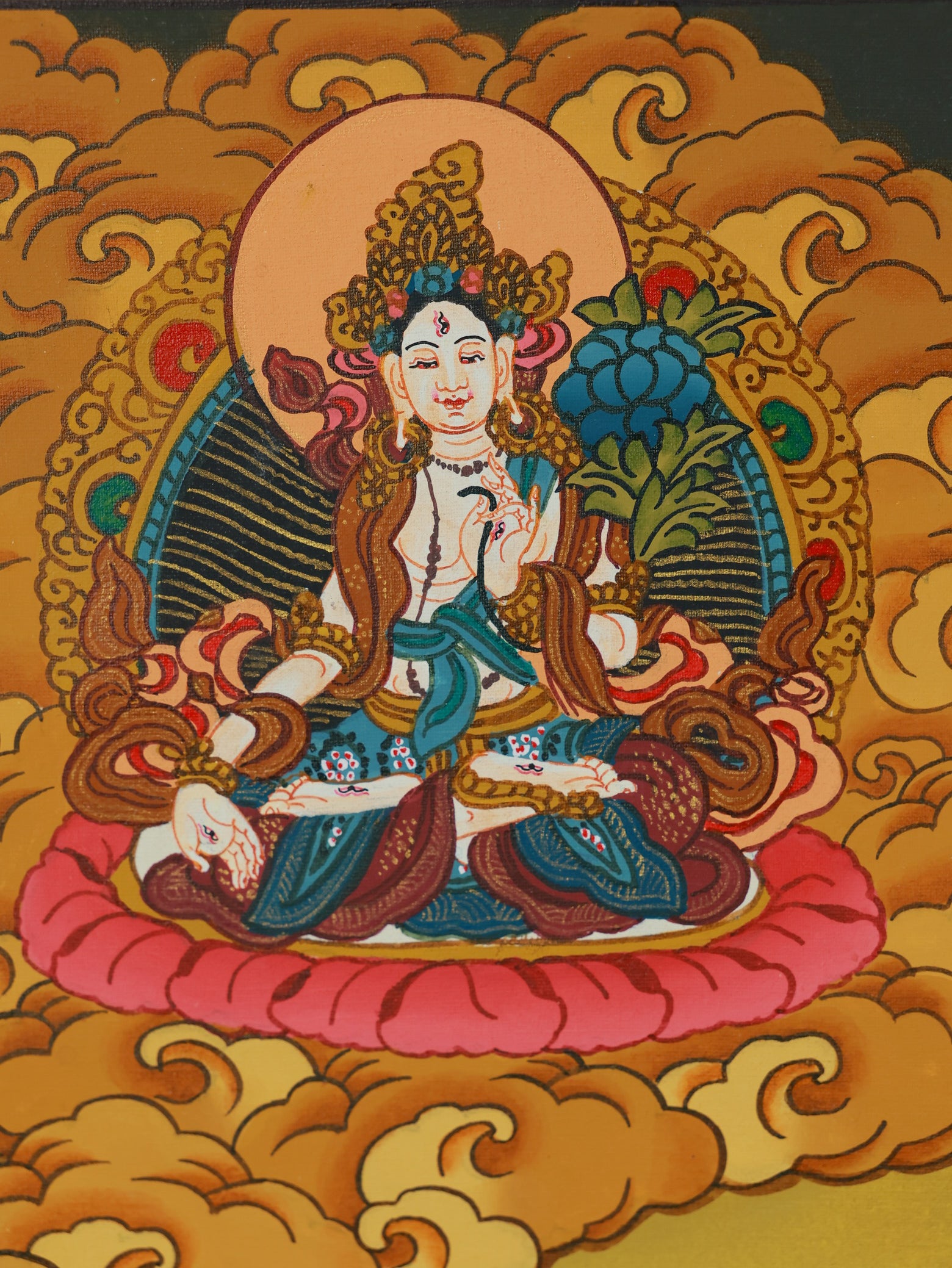 Four-Armed Avalokiteshvara thangka showing the compassion deity holding lotus and prayer beads in Tibetan Buddhist art
