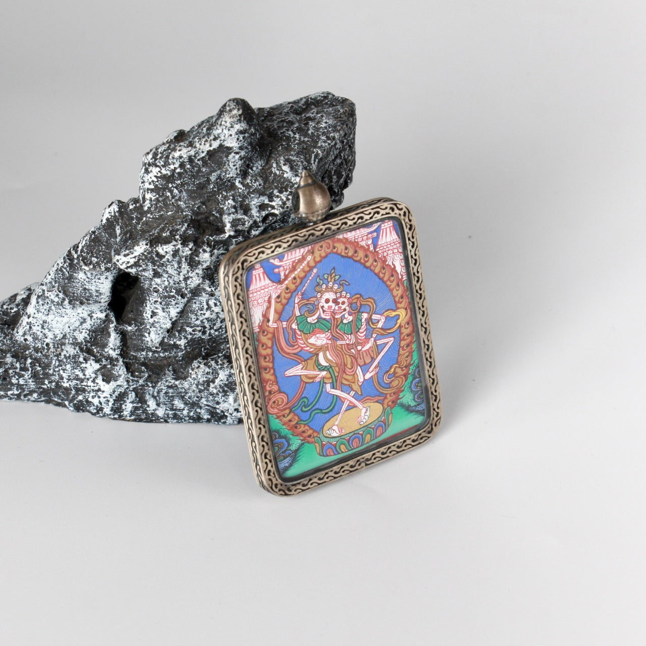  Close-up detail of the Rebgong Chitipati Thangka painting showing intricate natural mineral pigment work, showcasing the masterful artistry of Rebgong lineage painters.
