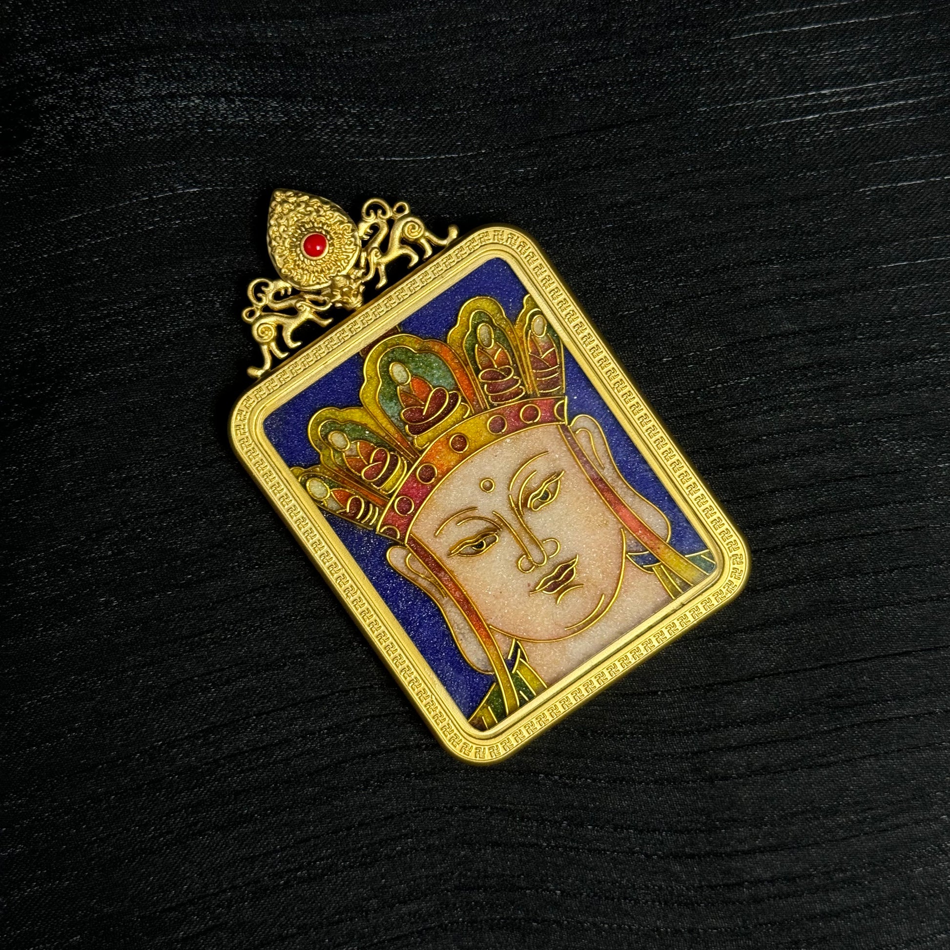  The cloisonné Ksitigarbha Thangka pendant displayed as a sacred amulet for compassion and protection.
