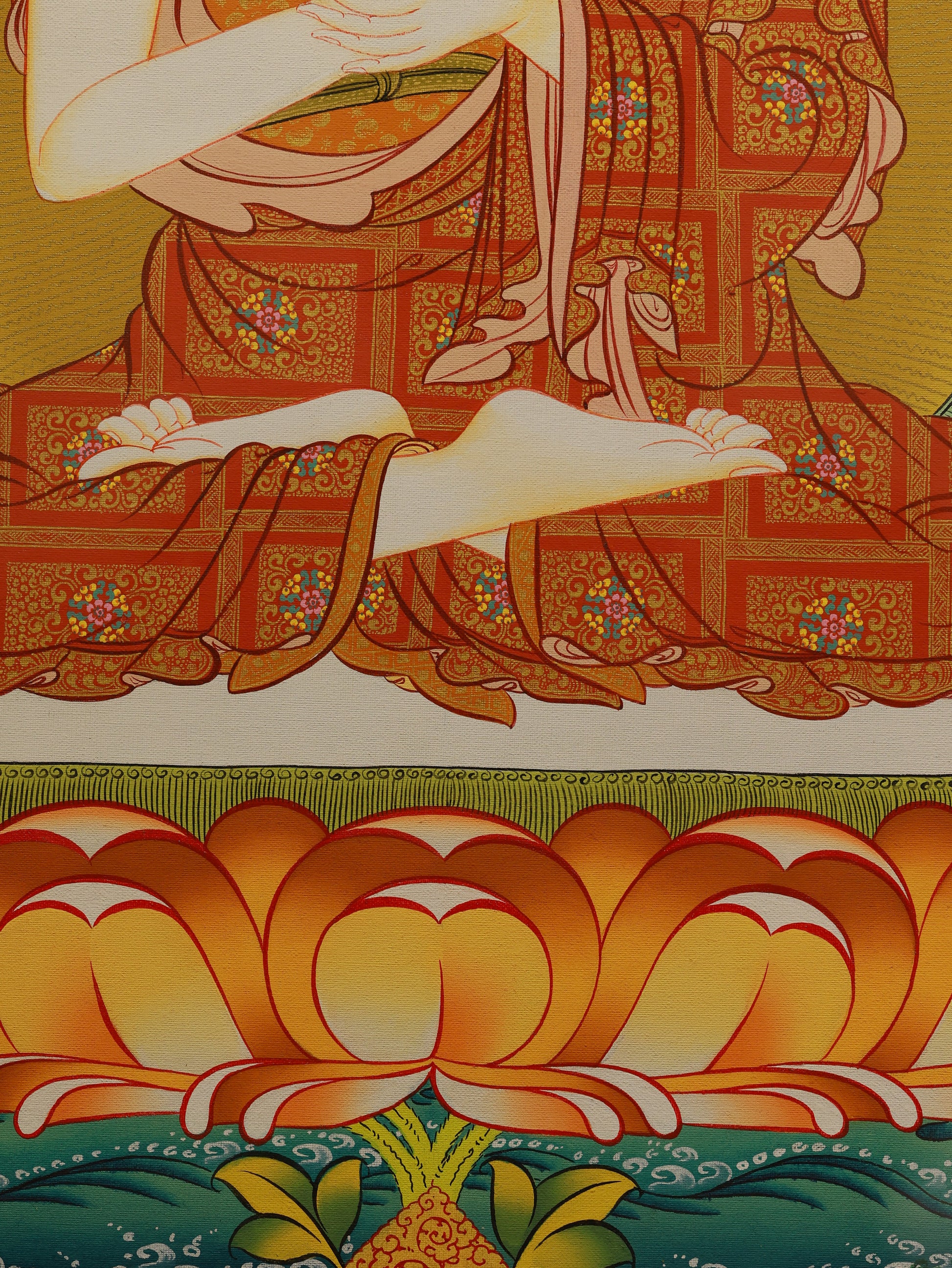 Colorful Tibetan Thangka depicting Dainichi Buddha surrounded by sacred Buddhist symbols and intricate designs.